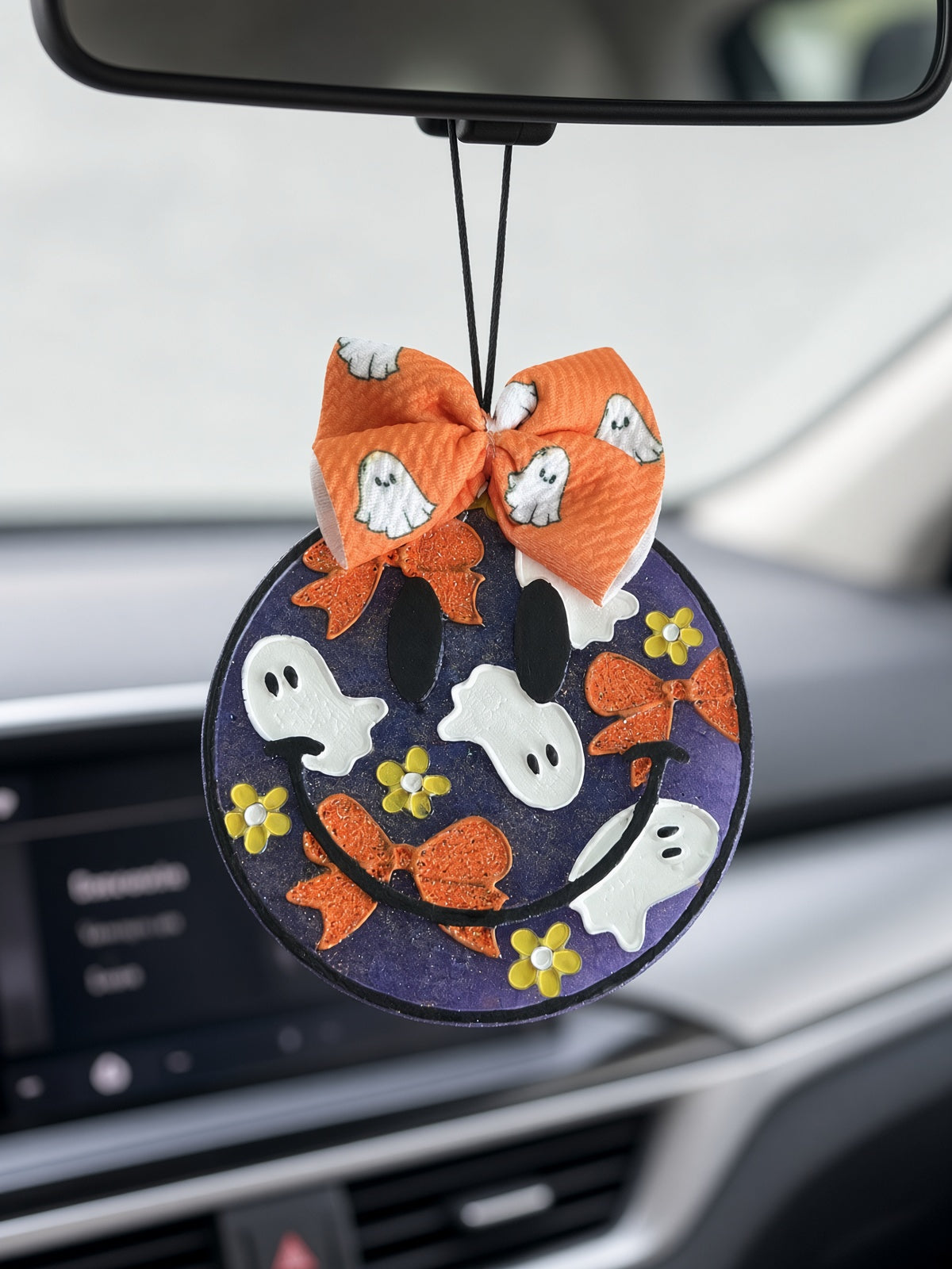 Boo Babe Car Freshie hanging from rearview mirror