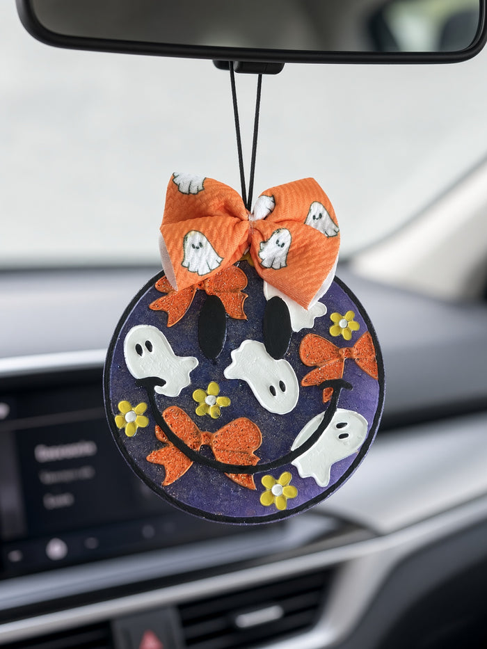 Boo Babe Car Freshie hanging from rearview mirror